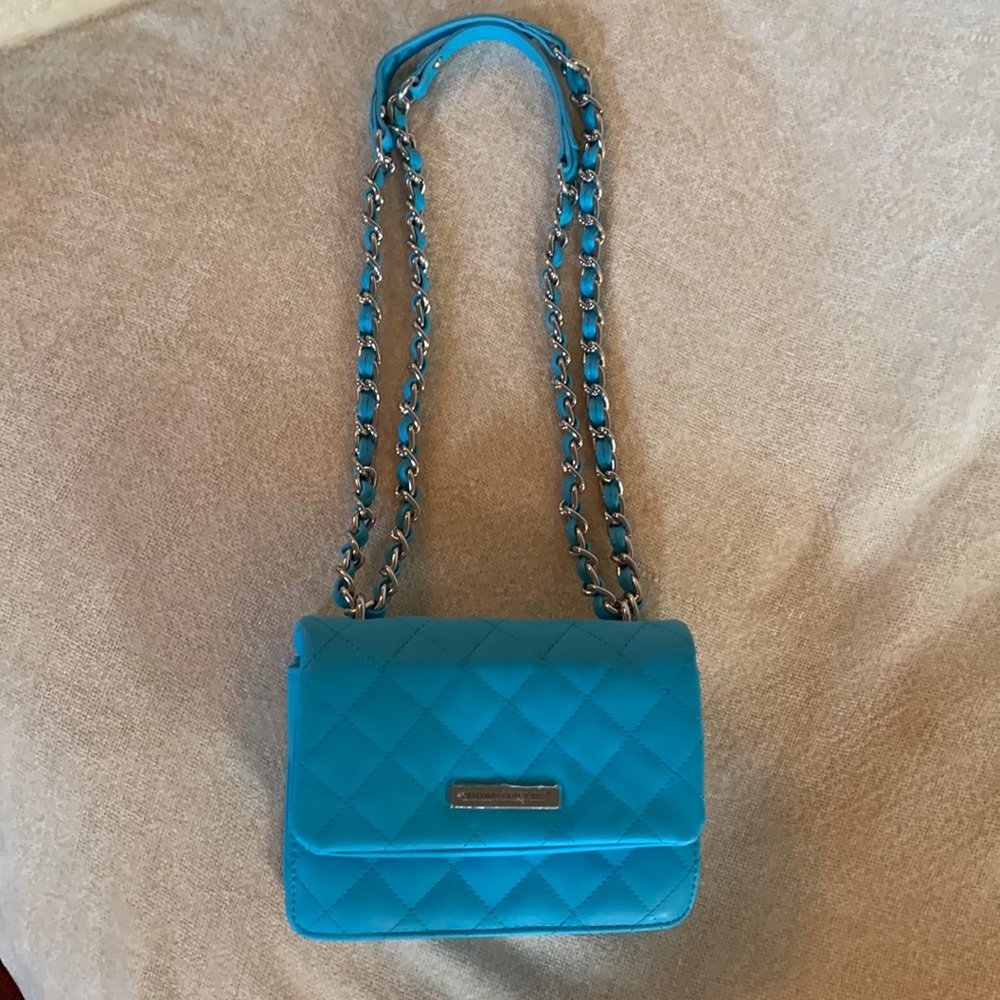 Rodan and Fields aqua blue cross body quilted bag